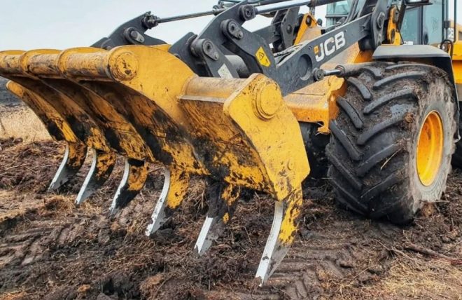 Корчеватели для погрузчиков: как выбрать эффективное оборудование для расчистки